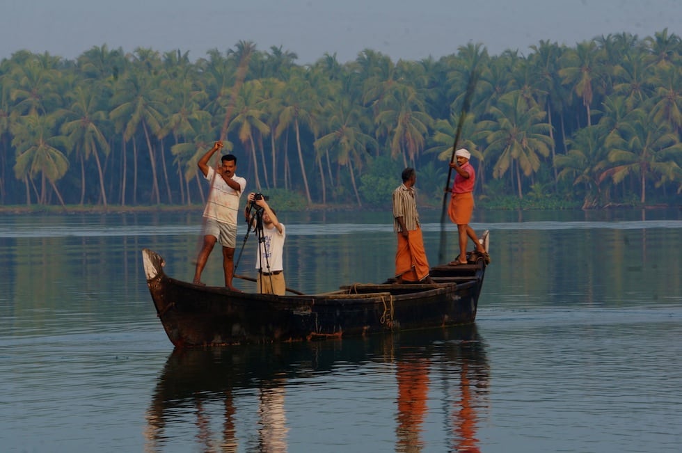 Zac Osgood, videographer, filming fishermen off The Lotus on the backwaters of Kerala.