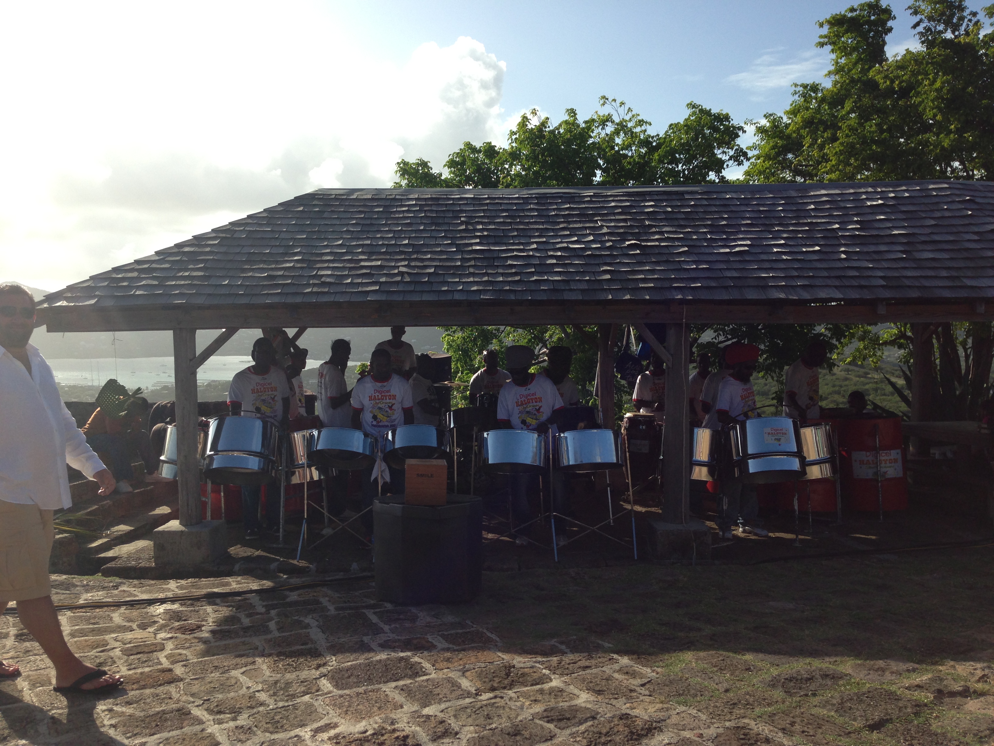 22-piece steel drum band playing during sunset