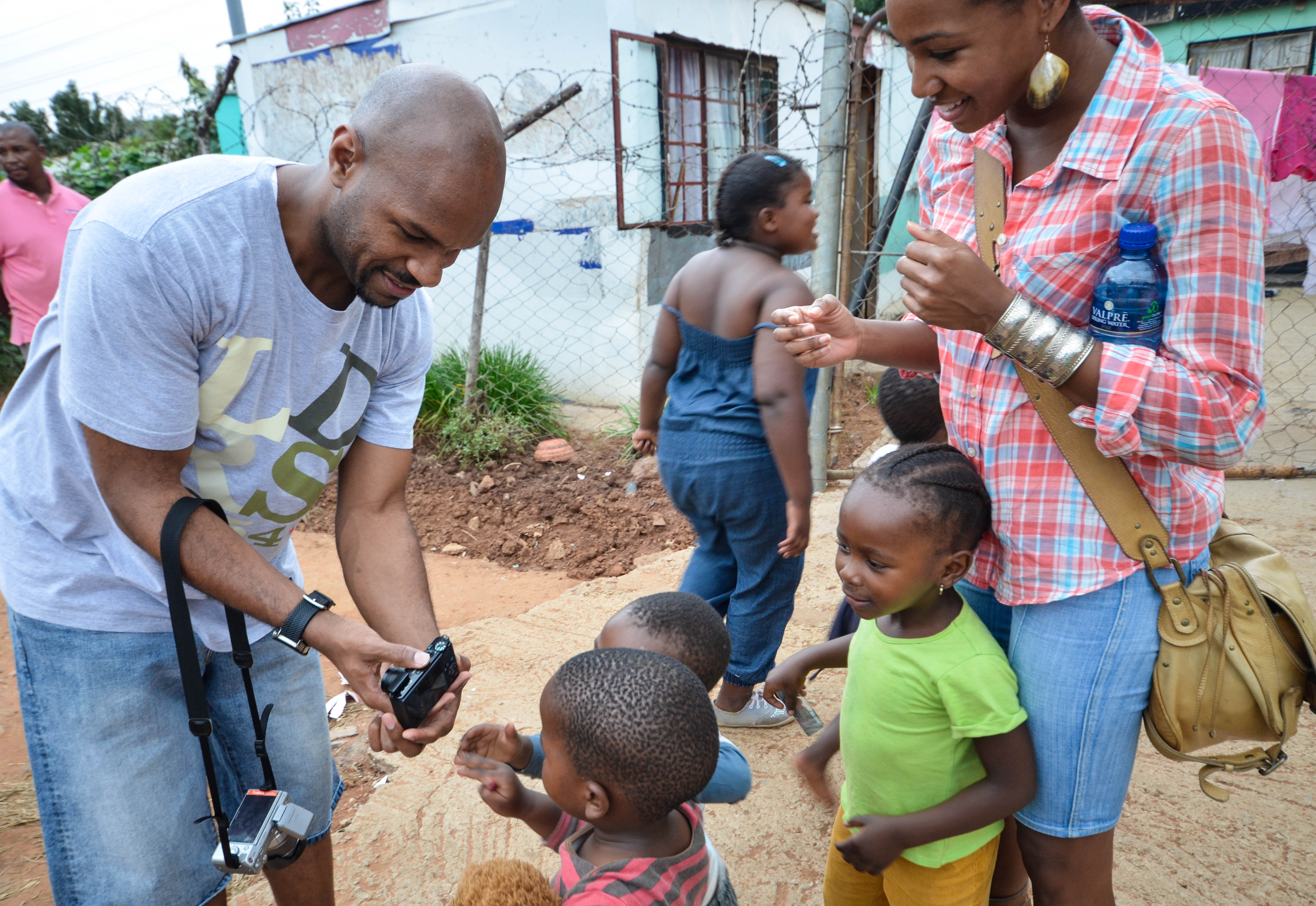 Kids are eager to see their own photo in Johannesburg's Motsoaledi township