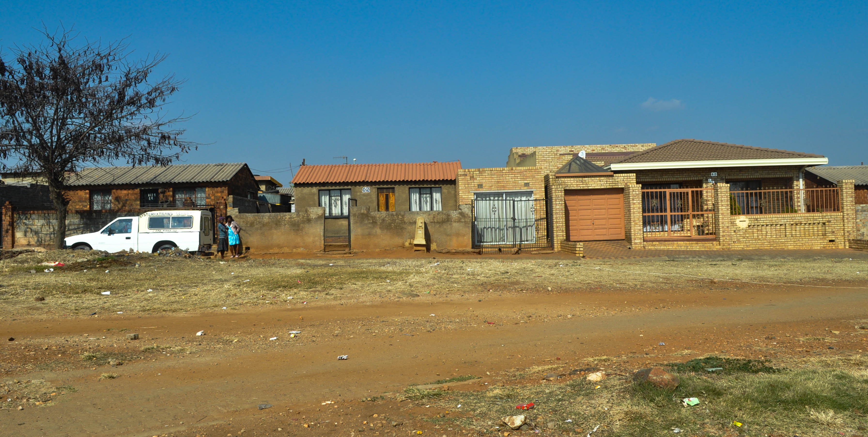 The evolution of township homes. Different phases of urban development all on the same street.