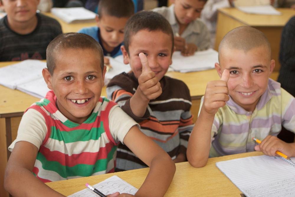 Give back. ZAANHA's impact: sending Afghan children to school. Photo Credit: ZAANHA.