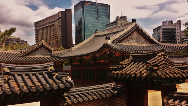 Deoksugung Palace juxtaposed with the new city of Seoul.