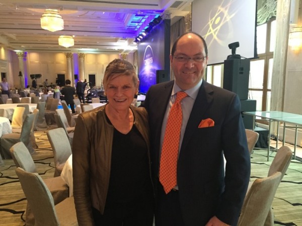 Mary with GM Max Musto in the large, pillar-free ballroom