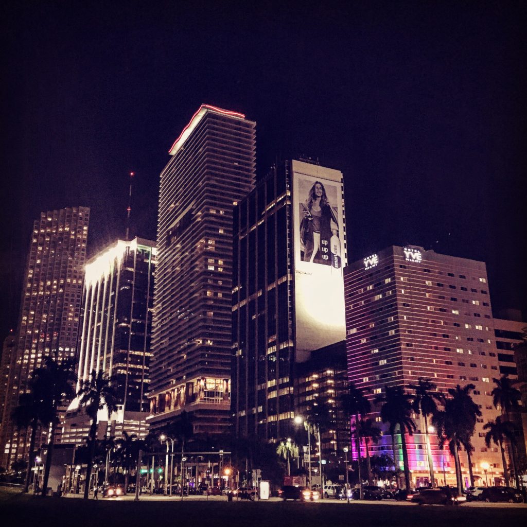 The YVE Hotel Miami lights up the city's downtown in the evening.